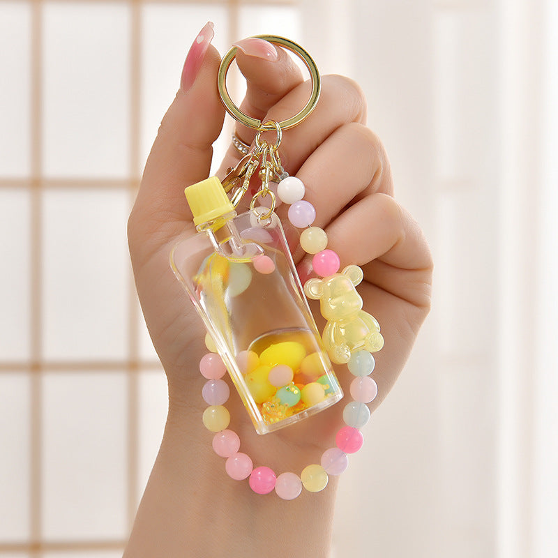 Wholesale Oil Quicksand Bottle Pearl Chain Acrylic Liquid Keychain